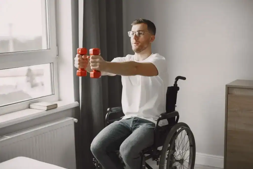 Empowering Weight Loss: A Comprehensive Guide for Individuals with Disabilities 1 Image of man doing exercise in his wheelchair to aid weight loss Rhyl
