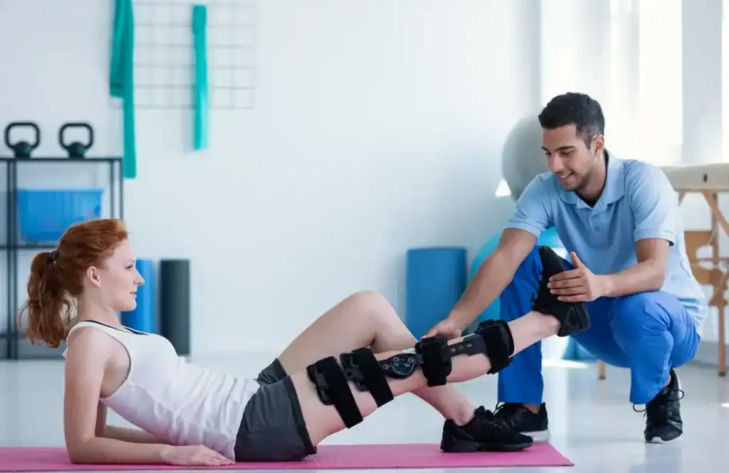Debunking Meal Timing Myths: The Truth About Muscle Recovery 1 Woman having treatment to help muscle recovery Rhyl after an injury