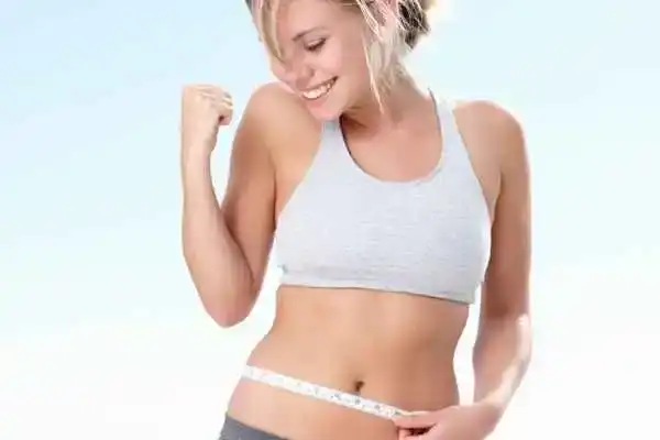 Unraveling the Mystery: Where Does the Body Fat Loss From First? 3 Image of woman happy with fat loss Rhyl