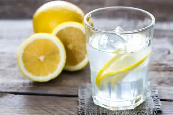 Hydration: The Secret Ingredient for a Toned Stomach and Enhanced Fitness 2 Image of lemon water to aid hydration Rhyl